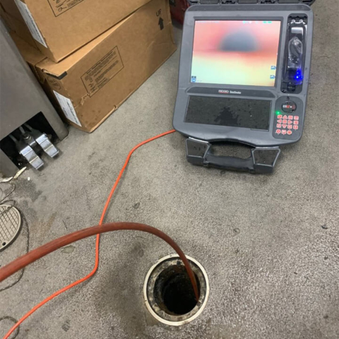 Imaging equipment being used to see what is clogging a sewer line