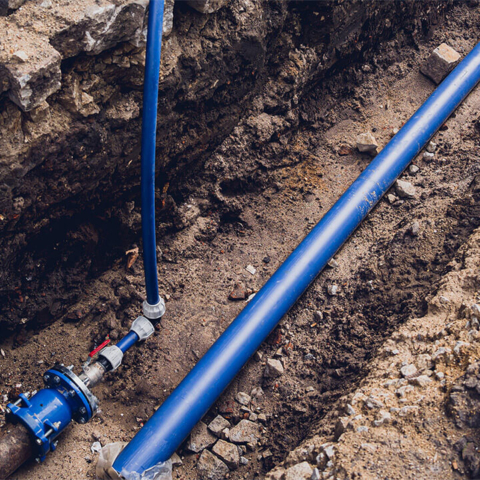 Image of equipment clearing a main sewer line.