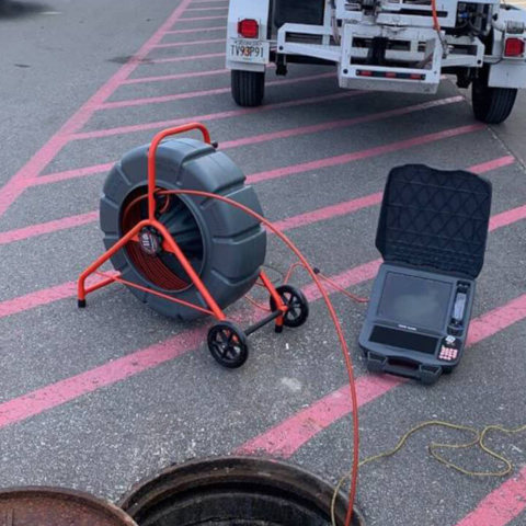 Image of hydro jetting equipment cleaning a sewer line.
